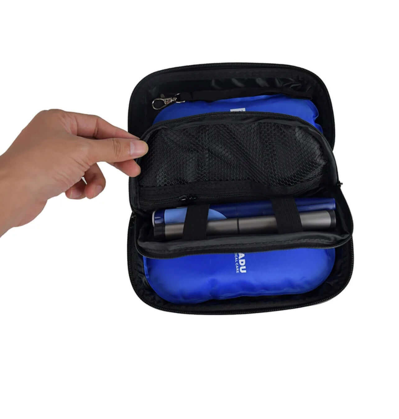 Inside view of a black organizer bag, featuring a hand opening it and revealing a blue interior with storage compartments.