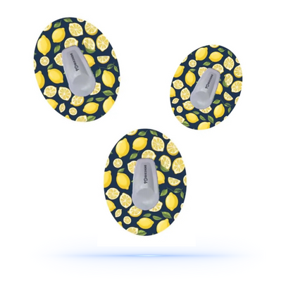 Tre CGM-patchar med livfulla citronmönster som svävar, vilket illustrerar deras roliga och fräscha stil.