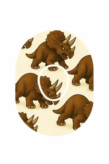 Dinosaurie Overpatch för Dexcom One+ med triceratops-motiv, håller sensorn säker under aktivitet. Perfekt för dinosauriefans.