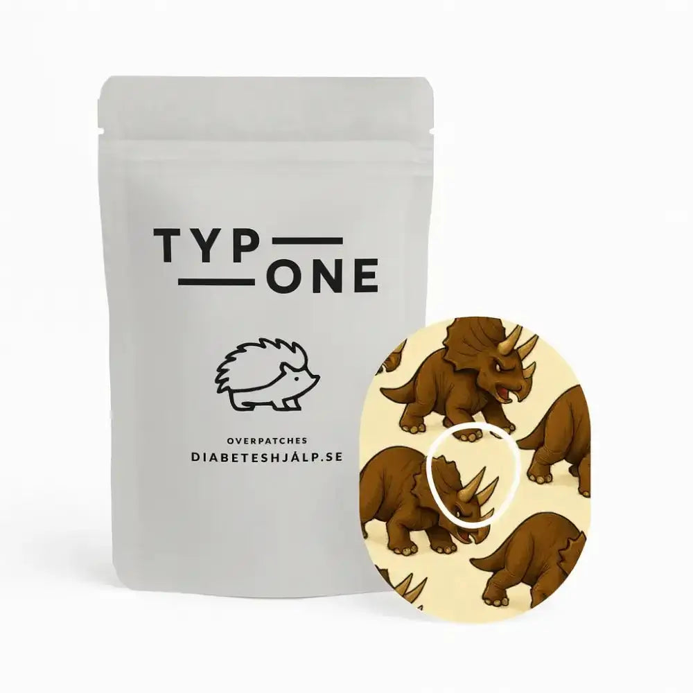 Dinosaurie Overpatch för Dexcom One+ – Triceratops Edition med förpackning och triceratops-motiv.